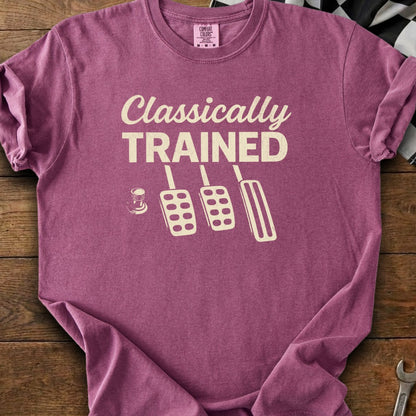 T-shirt with cream text "Classically TRAINED" and pedal graphic.