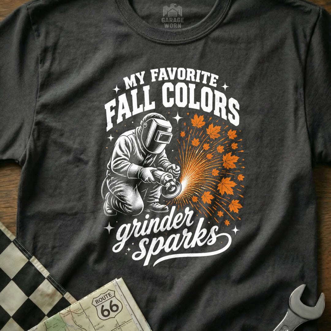 Dark t-shirt with "My Favorite Fall Colors grinder sparks" graphic featuring a welder.