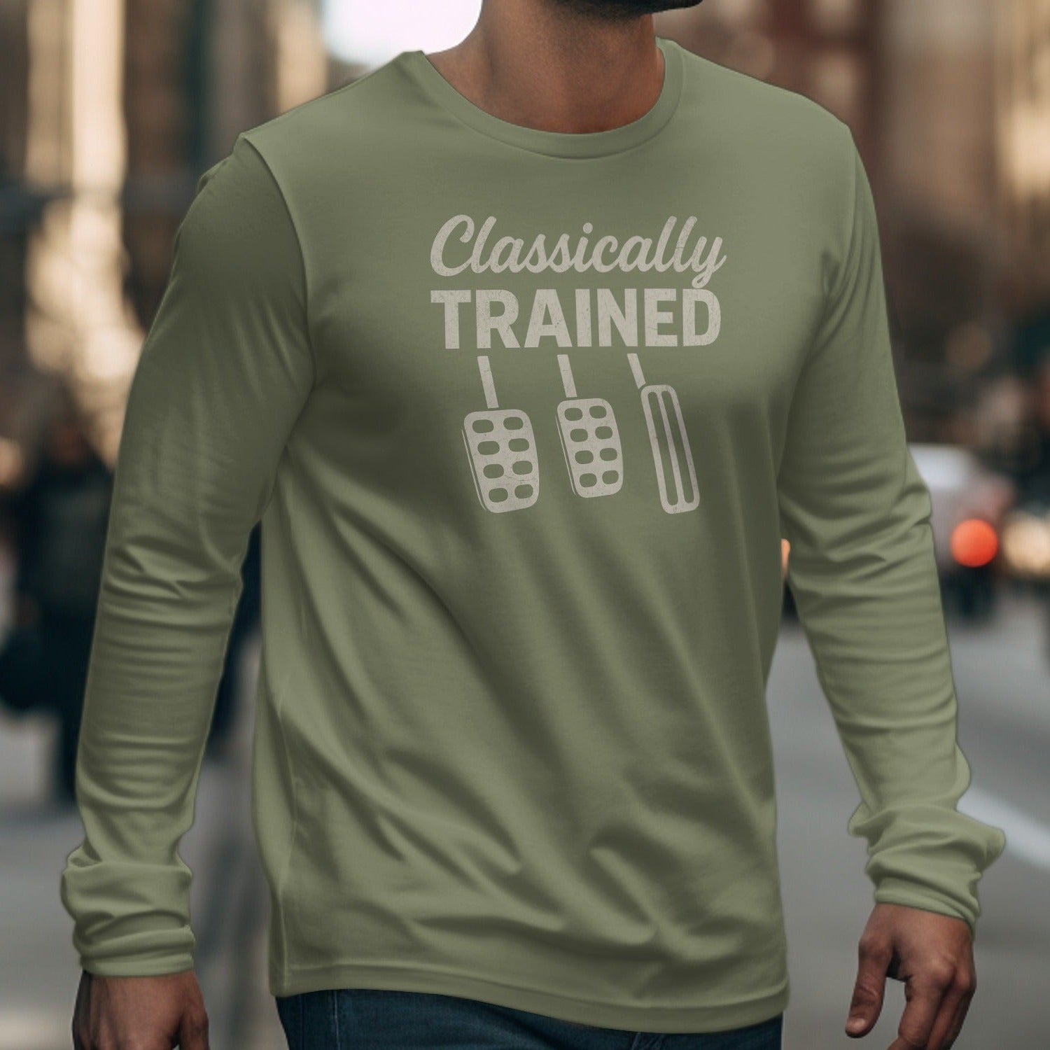 Olive green long-sleeve shirt with "Classically TRAINED" and three pedals graphic.