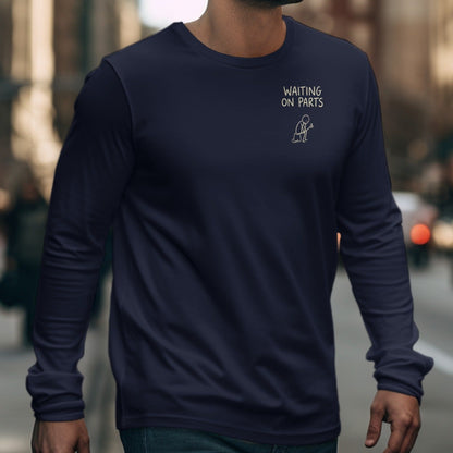 Navy long-sleeve shirt with "Waiting On Parts" text and stick figure graphic.