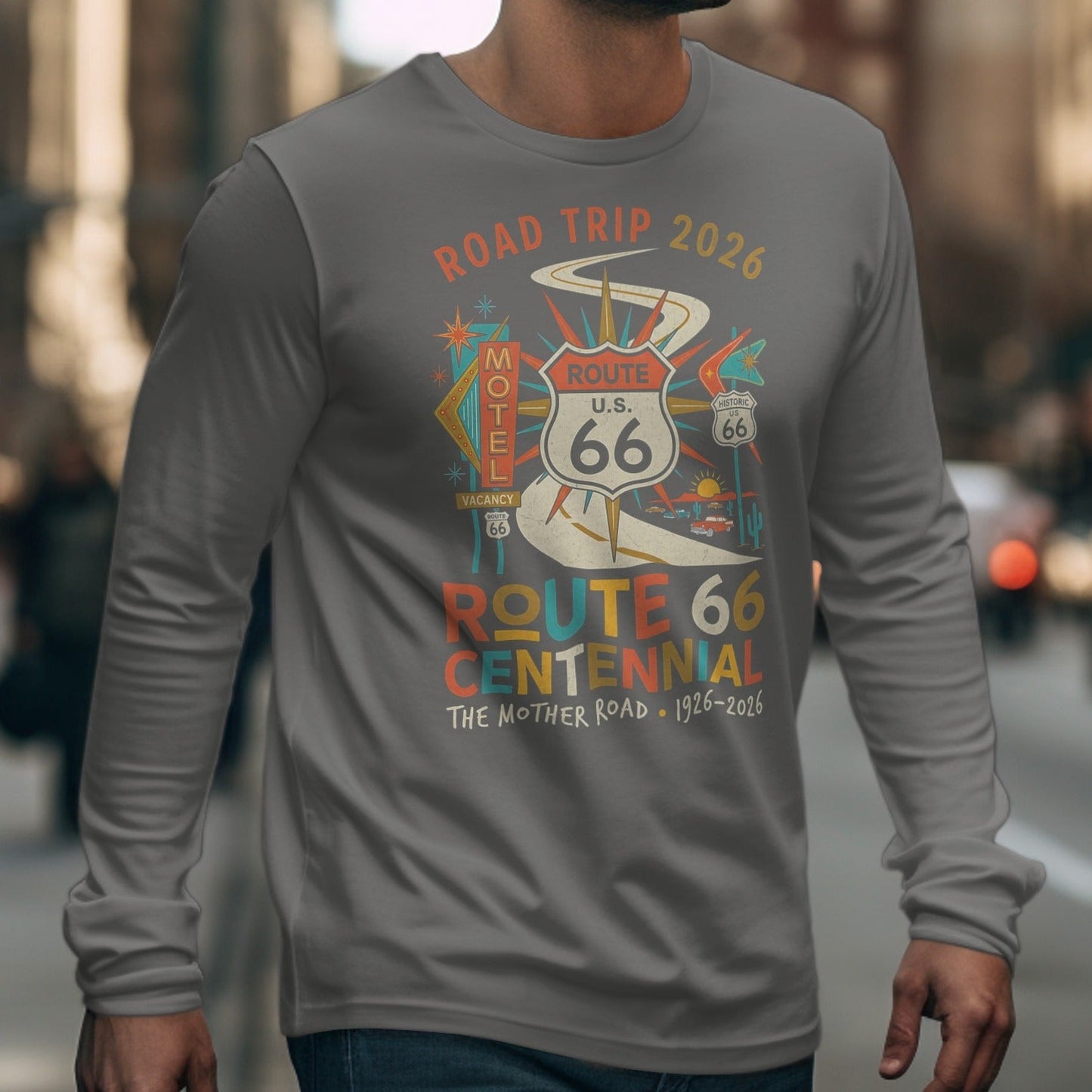 Grey long sleeve shirt with Route 66 Centennial graphic and "Road Trip 2026" text.