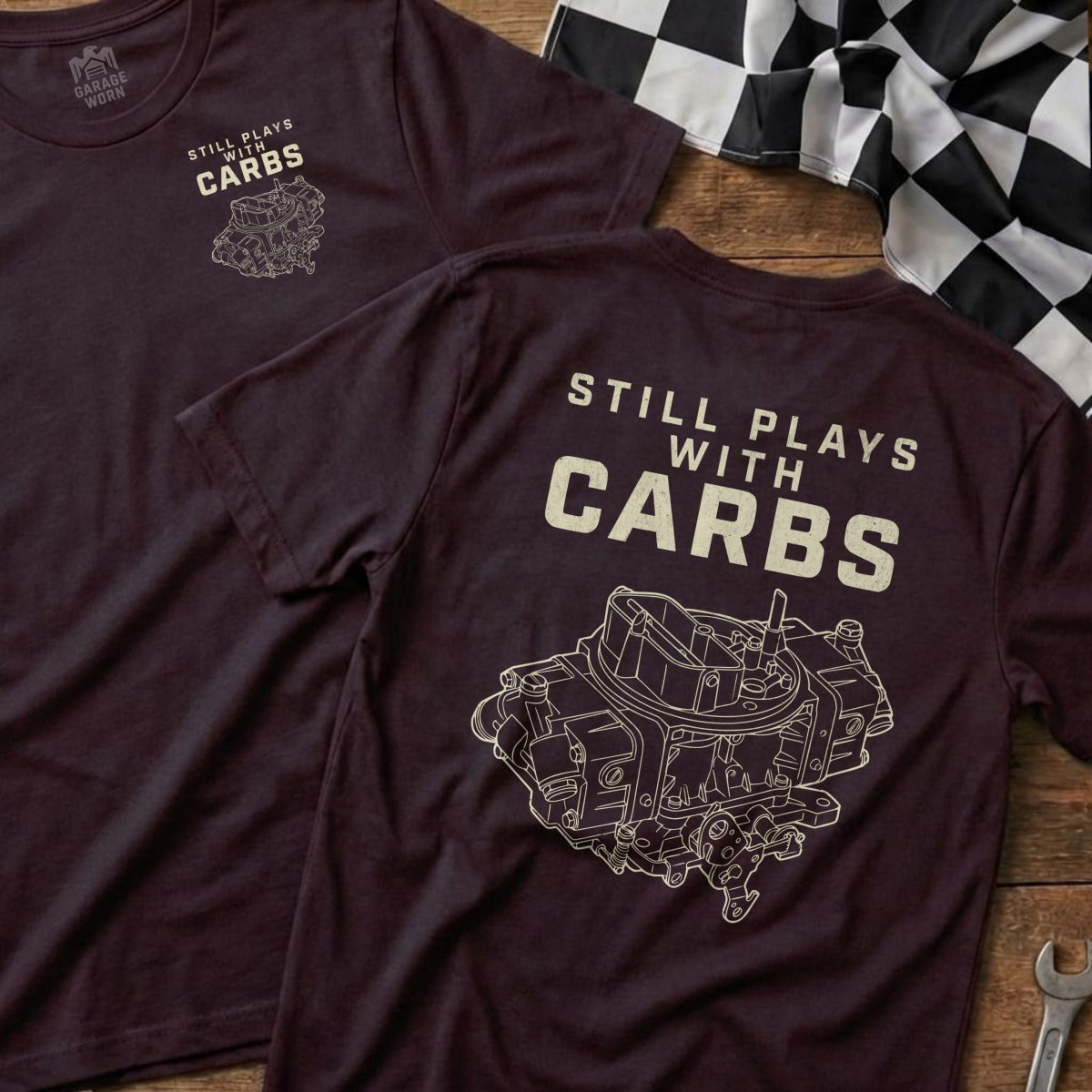 Burgundy t-shirt with "Still Plays With Carbs" and carburetor graphic.