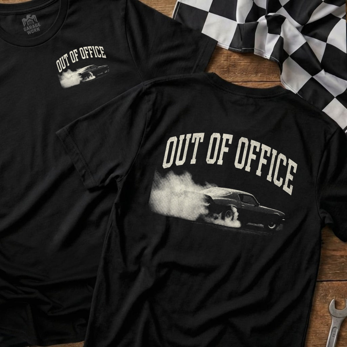 Black t-shirt with "OUT OF OFFICE" and a smoking car graphic.