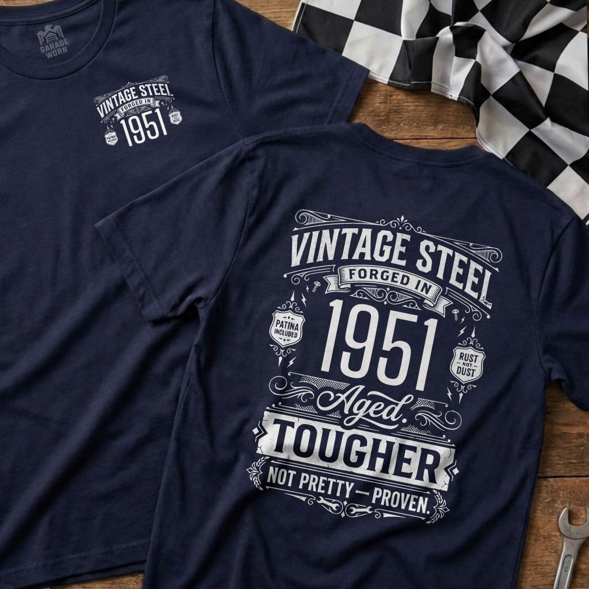 Navy t-shirt with "Vintage Steel 1951 Aged Tougher" text.