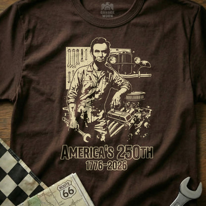 Abraham Lincoln leans on an engine, "America's 250th 1776-2026" text.