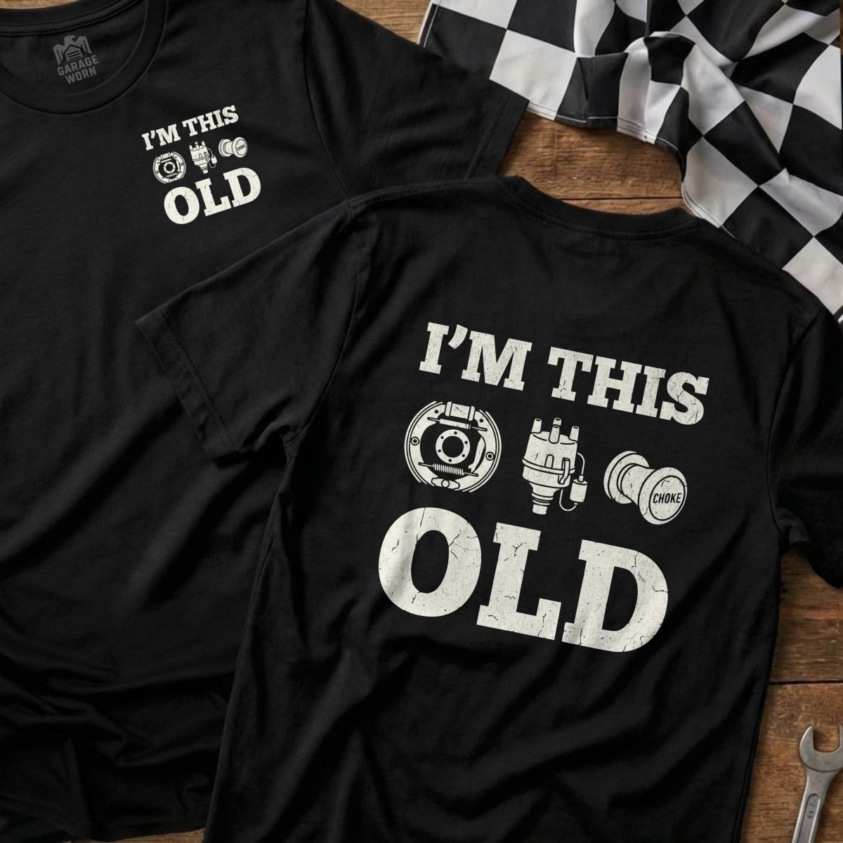 Black t-shirt with "I'm This Old" and vintage car parts graphics.