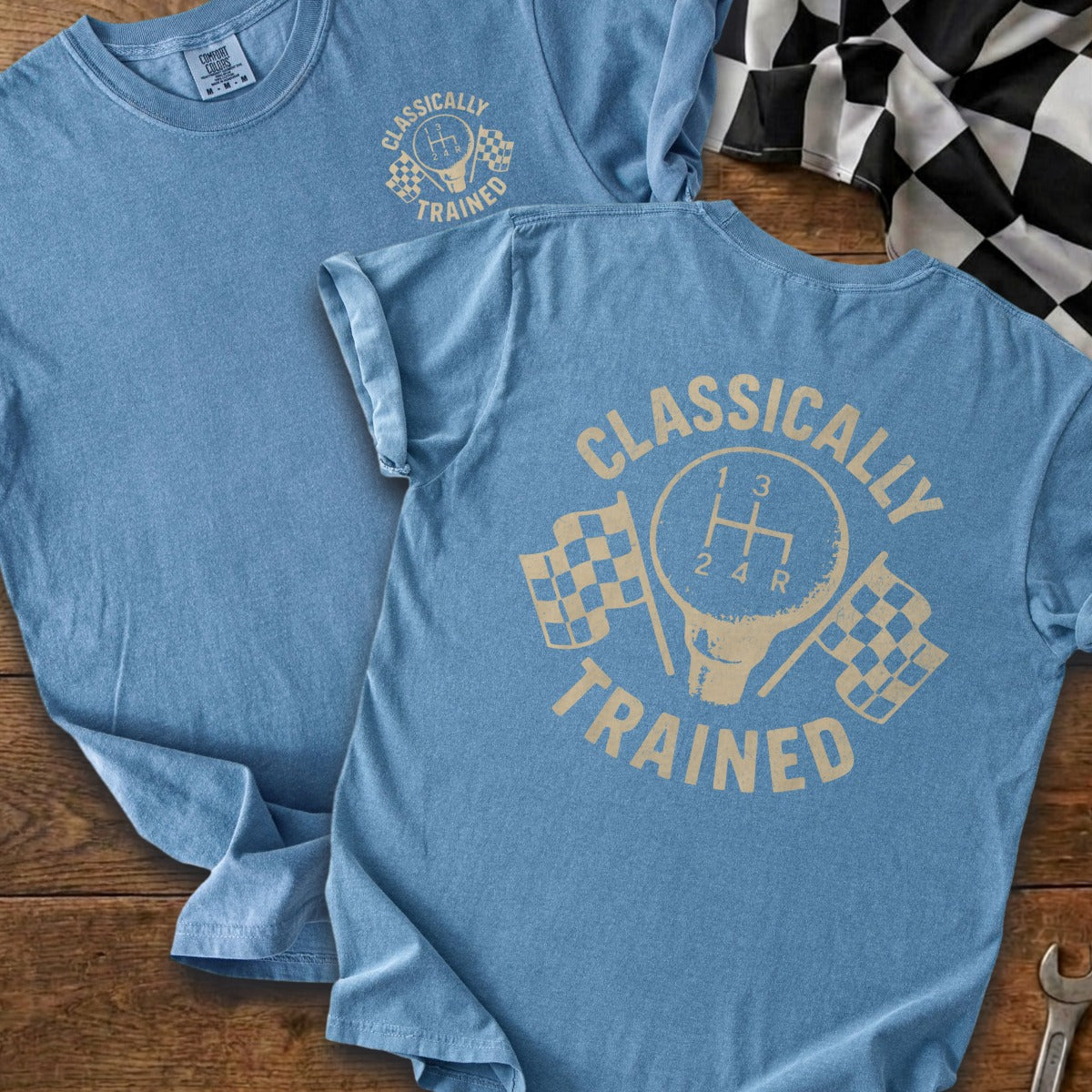 Blue t-shirts with "Classically Trained" text, gear shift, and checkered flags.