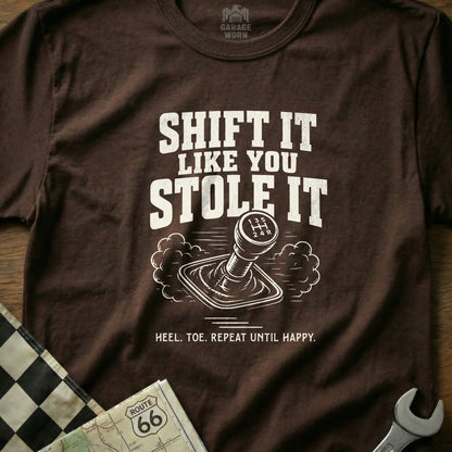 Brown t-shirt with "Shift it like you stole it" graphic.
