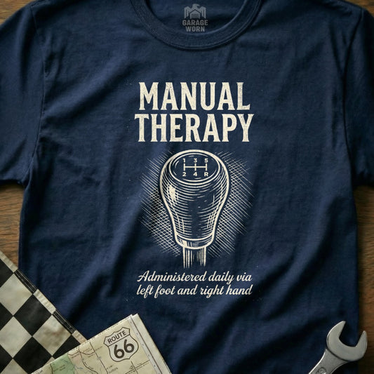Navy t-shirt with "Manual Therapy" and gear shift graphic.