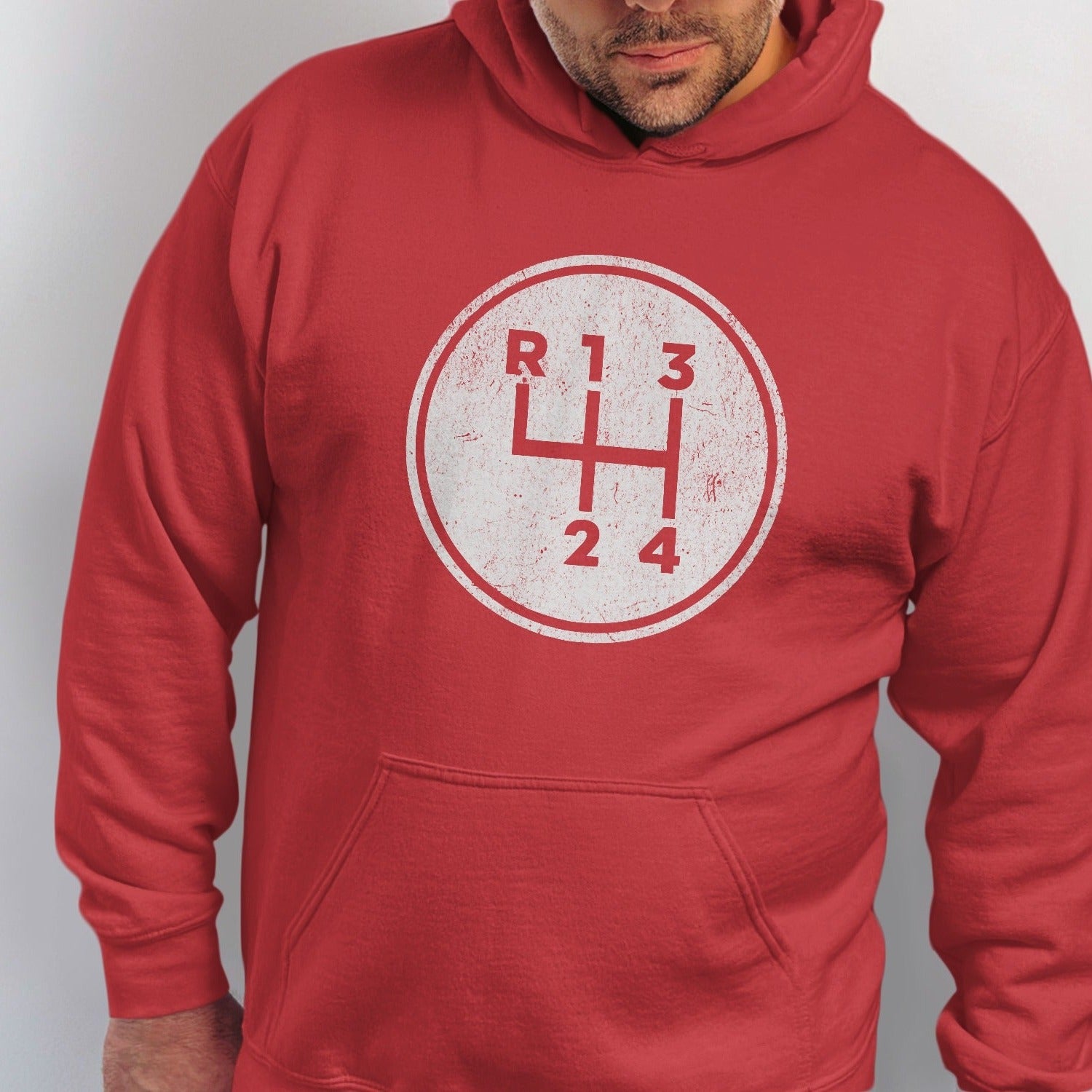 Red hoodie with a manual gear shift pattern graphic.