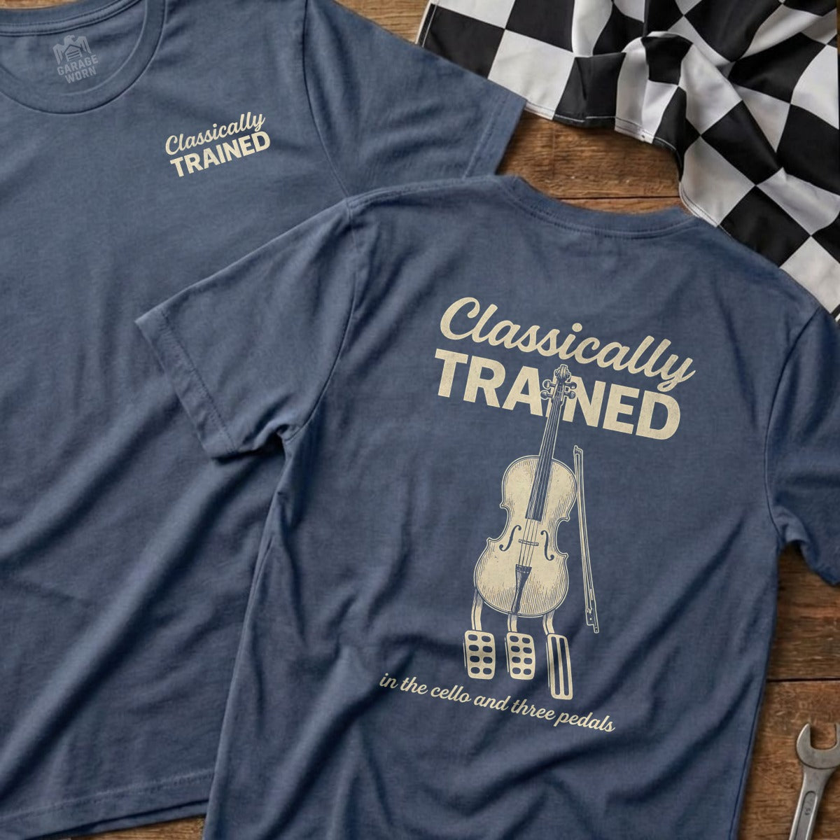 Blue t-shirt with cello, bow, and text: "Classically Trained in the cello and three pedals".