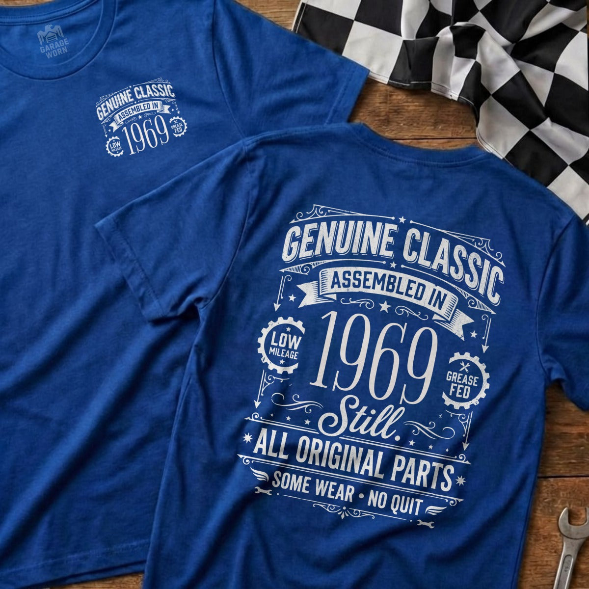 Blue t-shirt with "Genuine Classic Assembled in 1969" and racing flag.