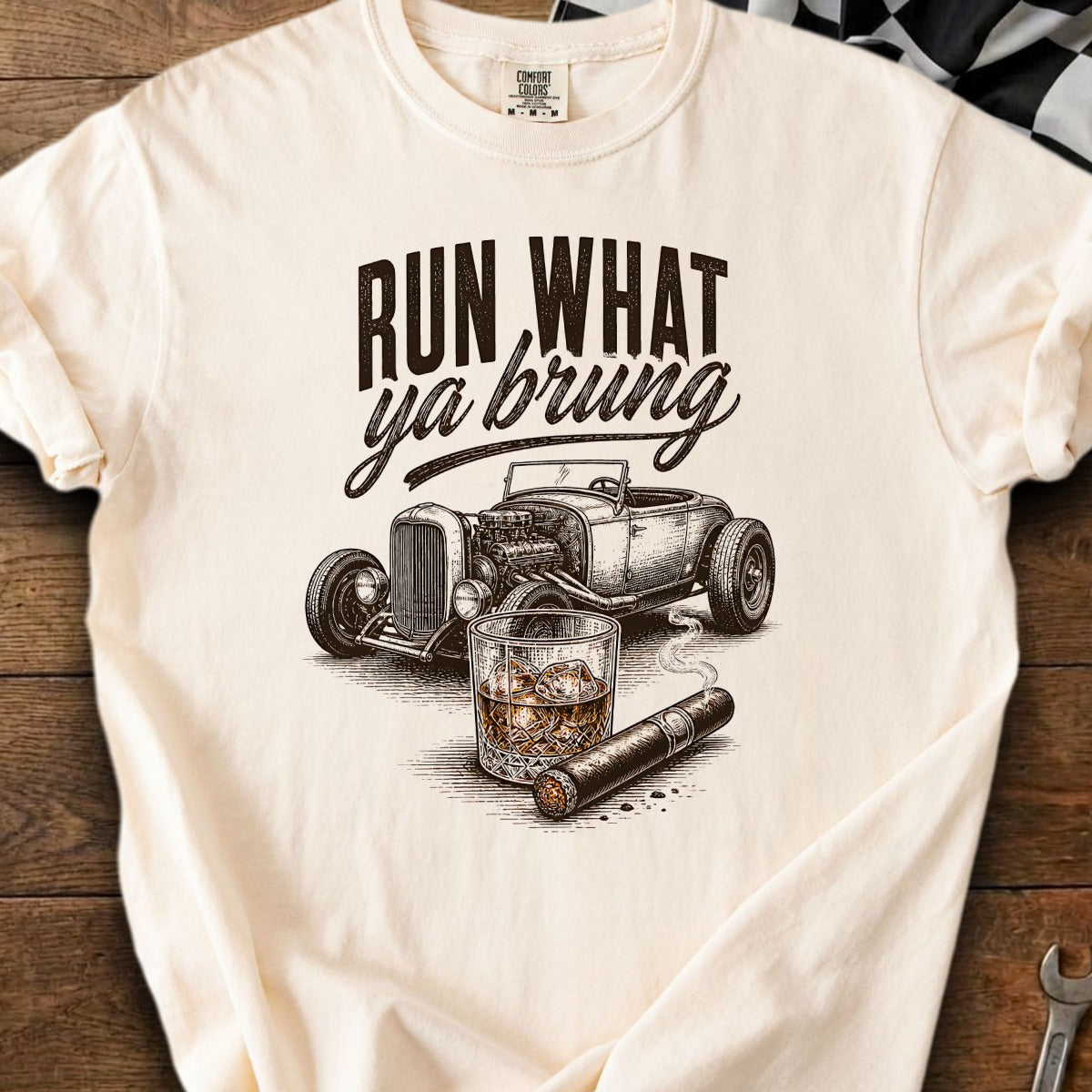 T-shirt with "RUN WHAT ya brung" text, hot rod, whiskey, and cigar.