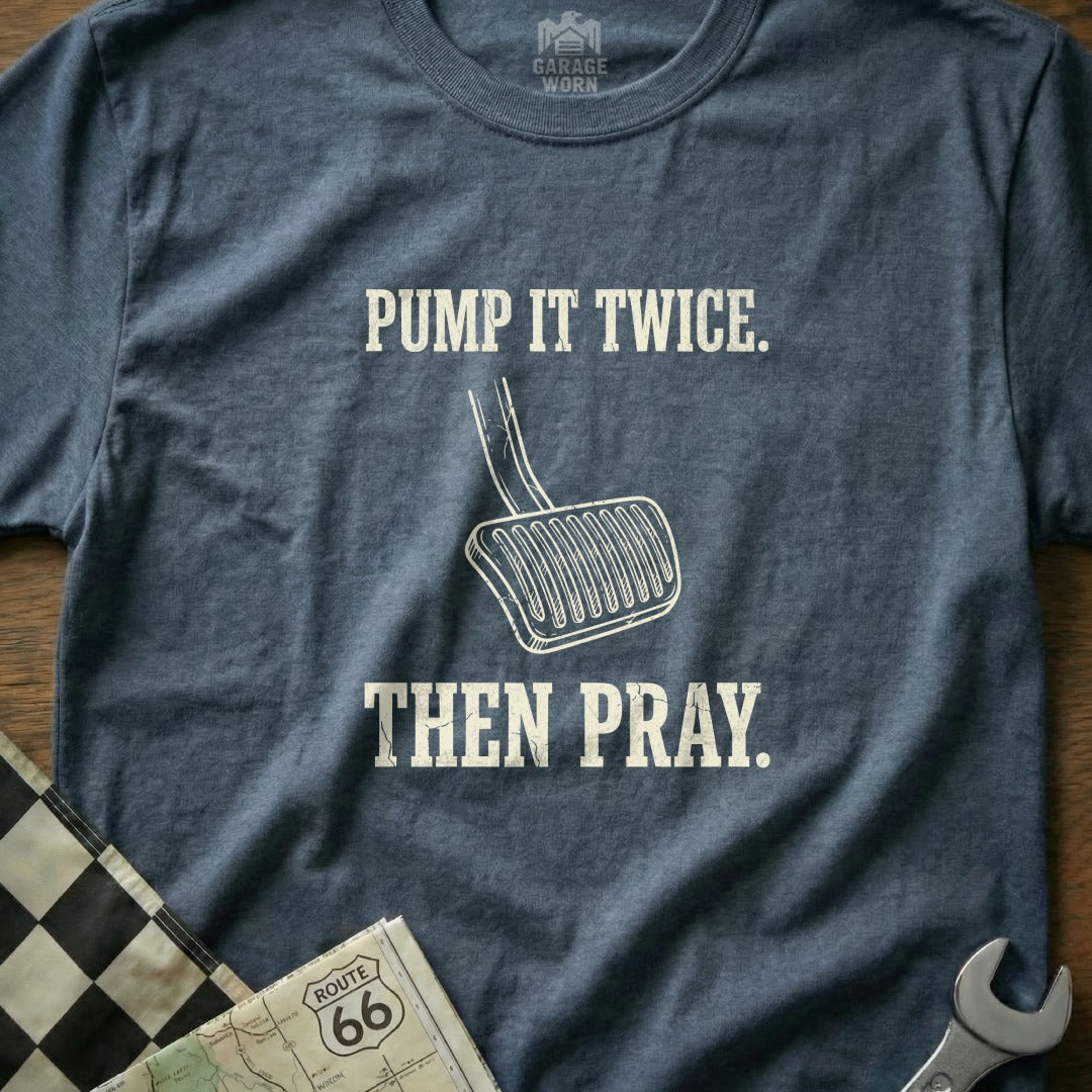 Navy t-shirt with "PUMP IT TWICE. THEN PRAY." text and a gas pedal graphic.