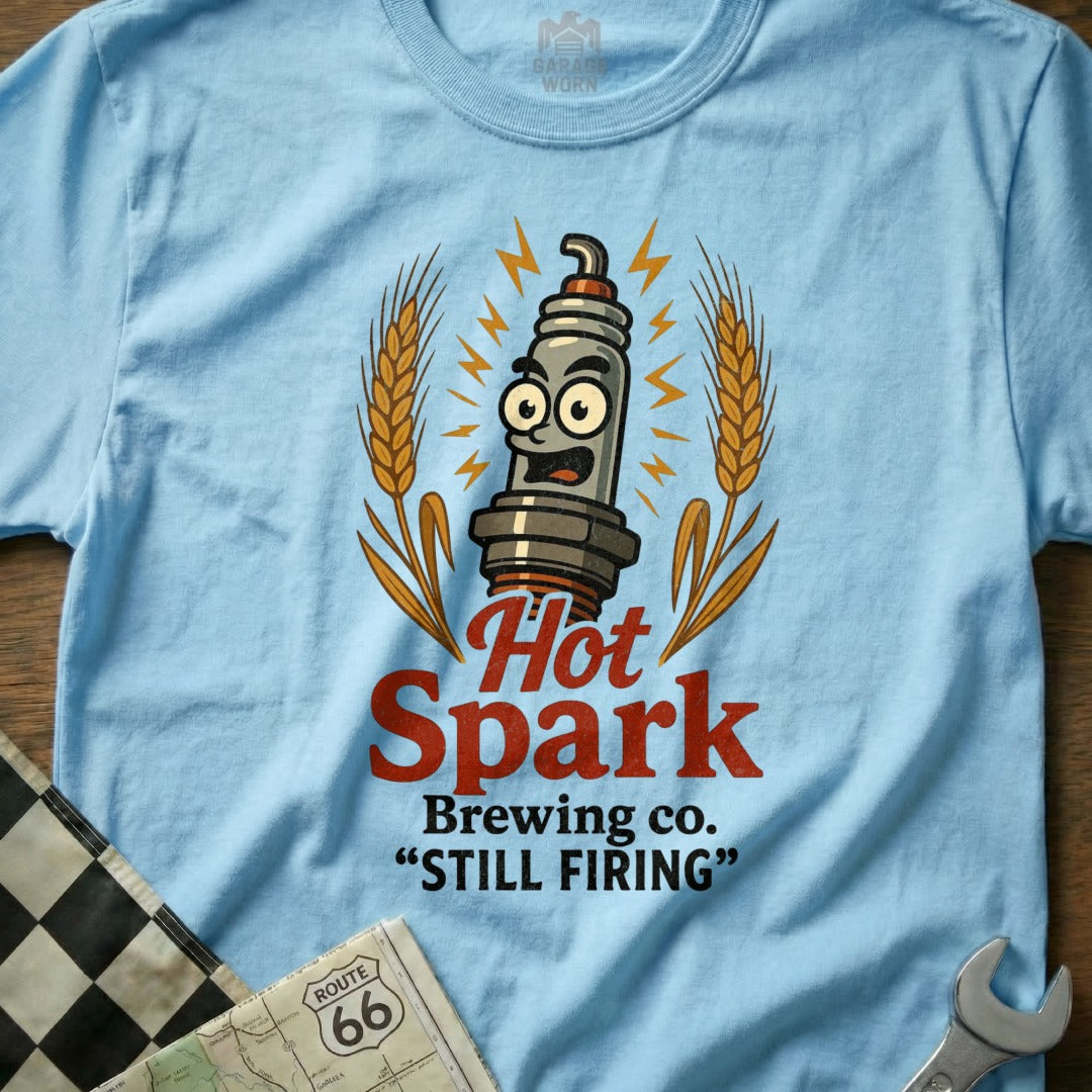 Light blue t-shirt with "Hot Spark Brewing Co. STILL FIRING" and cartoon spark plug graphic.