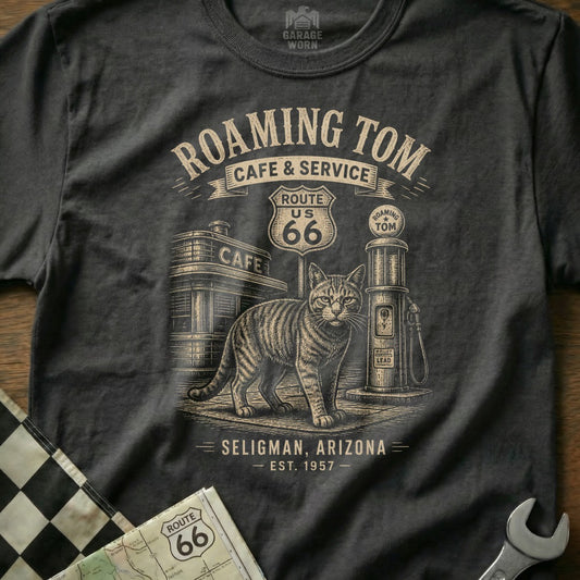 T-shirt graphic with a cat, Route 66 sign, cafe, and gas pump.
