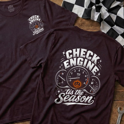 Maroon t-shirt with "Check Engine 'tis the Season" graphic featuring gauges and a pumpkin.