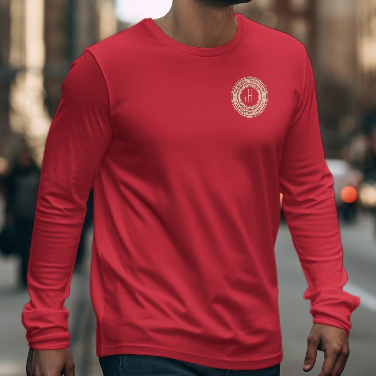 Red long-sleeve t-shirt with Manual Transmission Preservation Society logo.