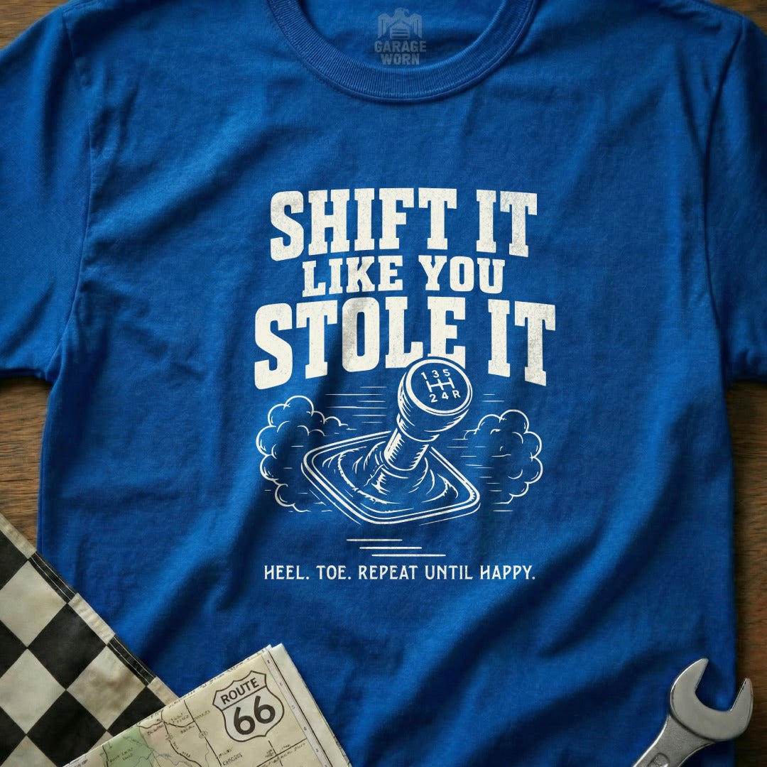 Blue t-shirt with "SHIFT IT LIKE YOU STOLE IT" text and gear shift illustration.