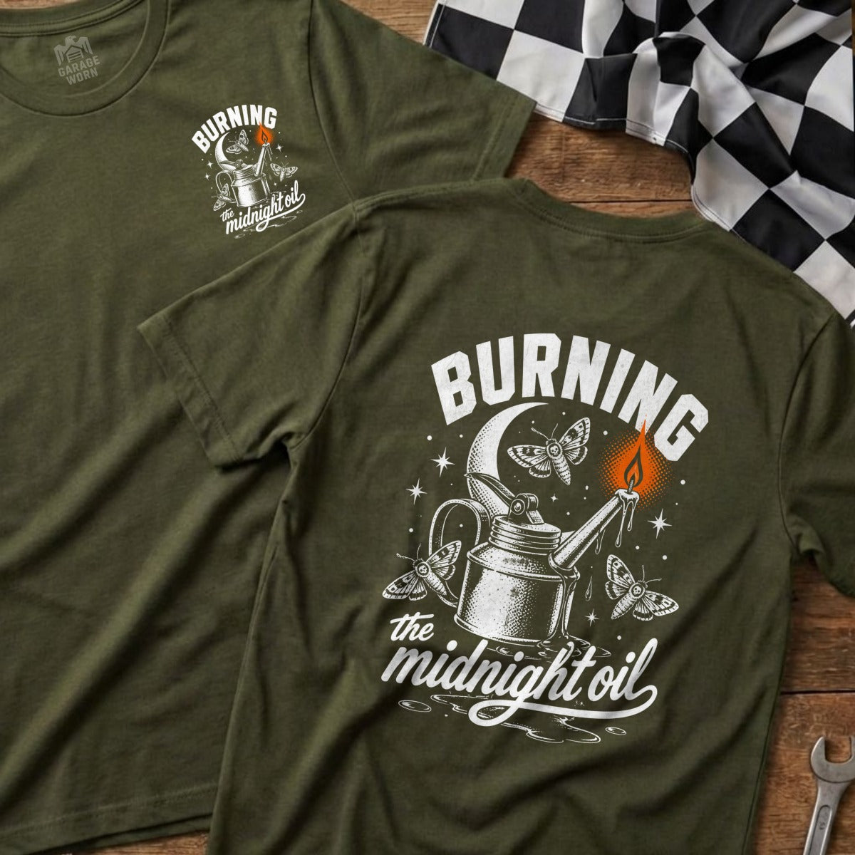 Green t-shirt with "BURNING the midnight oil" graphic and moths around a can with a flame.