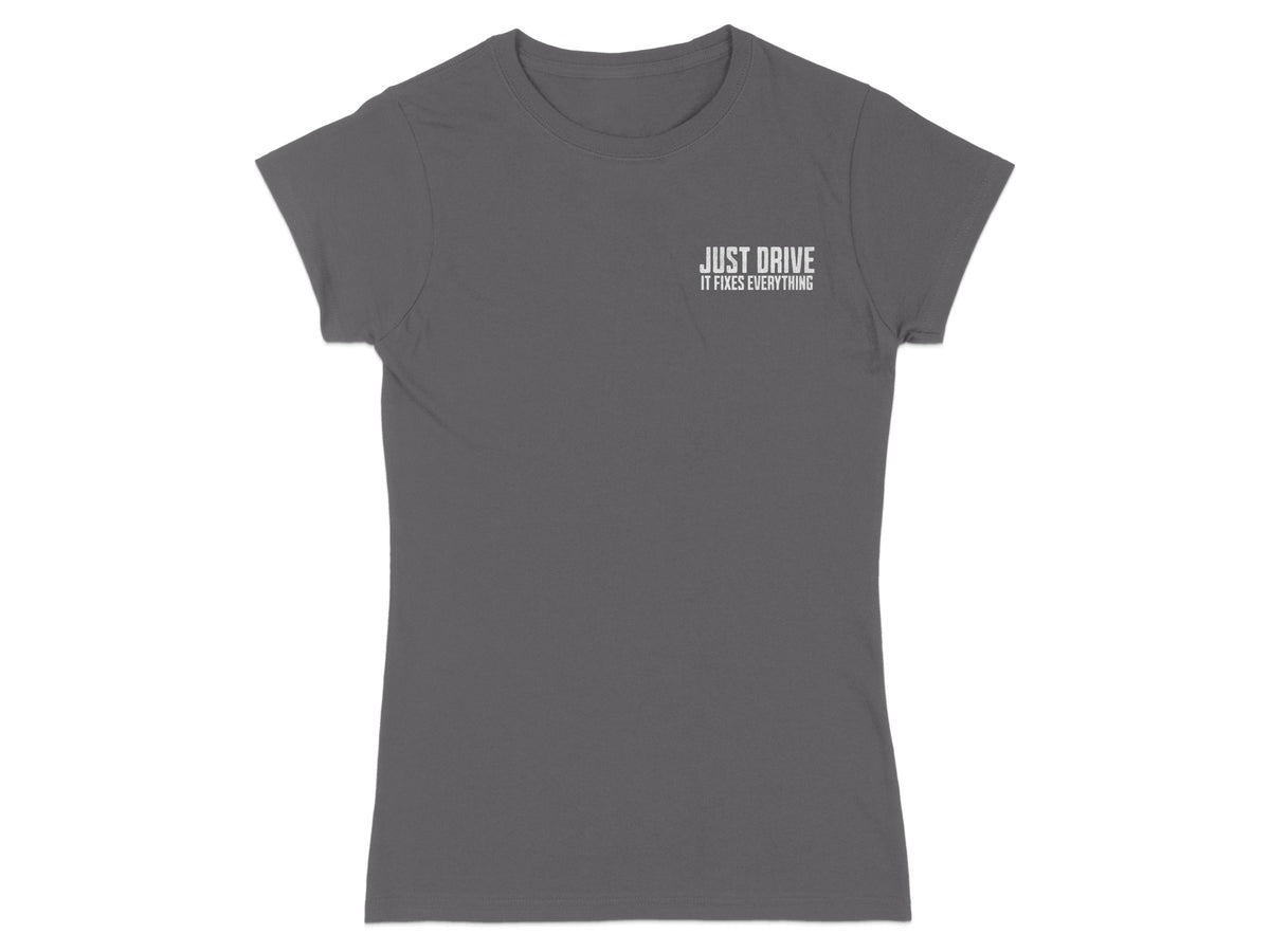 Gray t-shirt with "JUST DRIVE IT FIXES EVERYTHING" text printed on the chest.