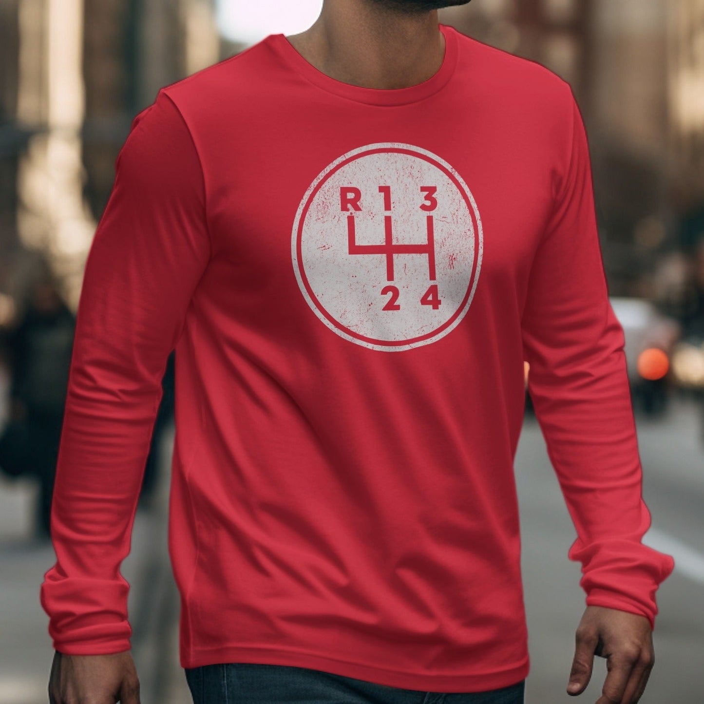 Red long-sleeve shirt with vintage manual transmission gear shift pattern graphic.