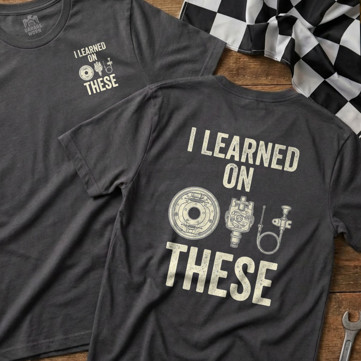 Dark gray t-shirt with "I LEARNED ON THESE" and automotive parts graphic.