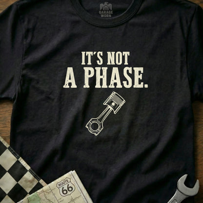 Black t-shirt with "It's NOT a PHASE." and a piston graphic.