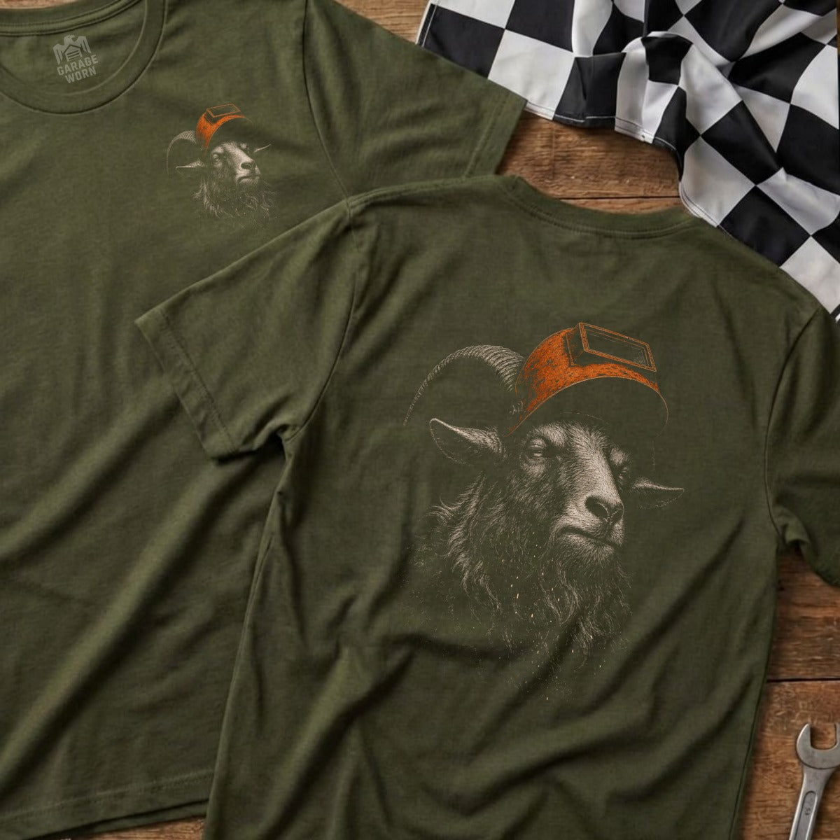 Green t-shirt with illustration of ram wearing welding mask, chest logo visible.