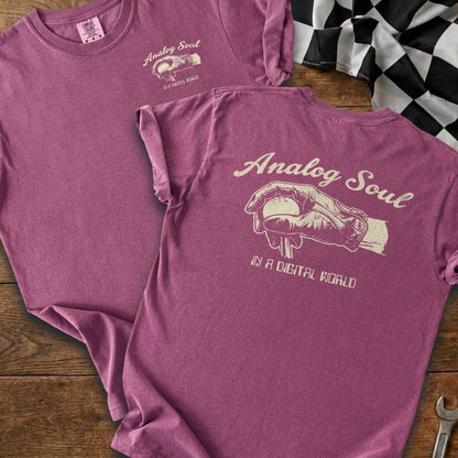 Pink t-shirt with "Analog Soul" text and a hand holding a baseball graphic.