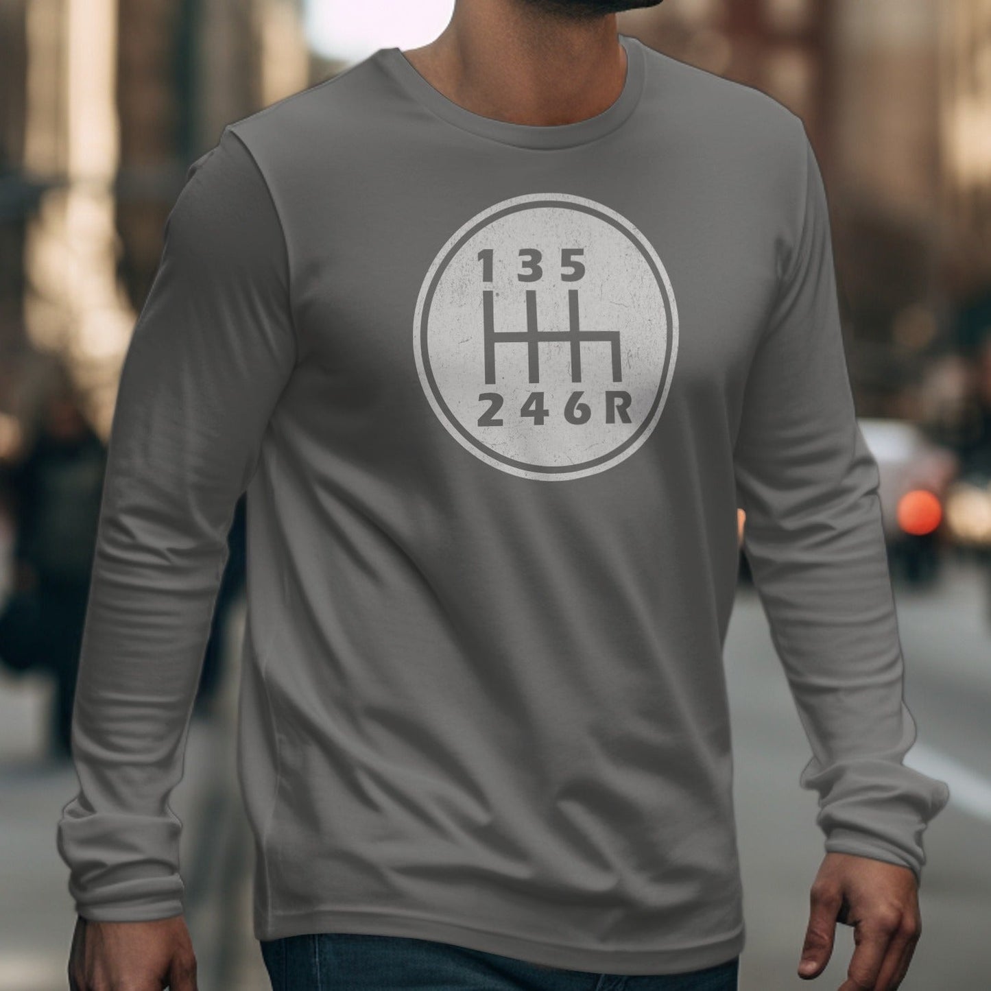 Gray long sleeve shirt with a white 6-speed manual gear shift pattern graphic.
