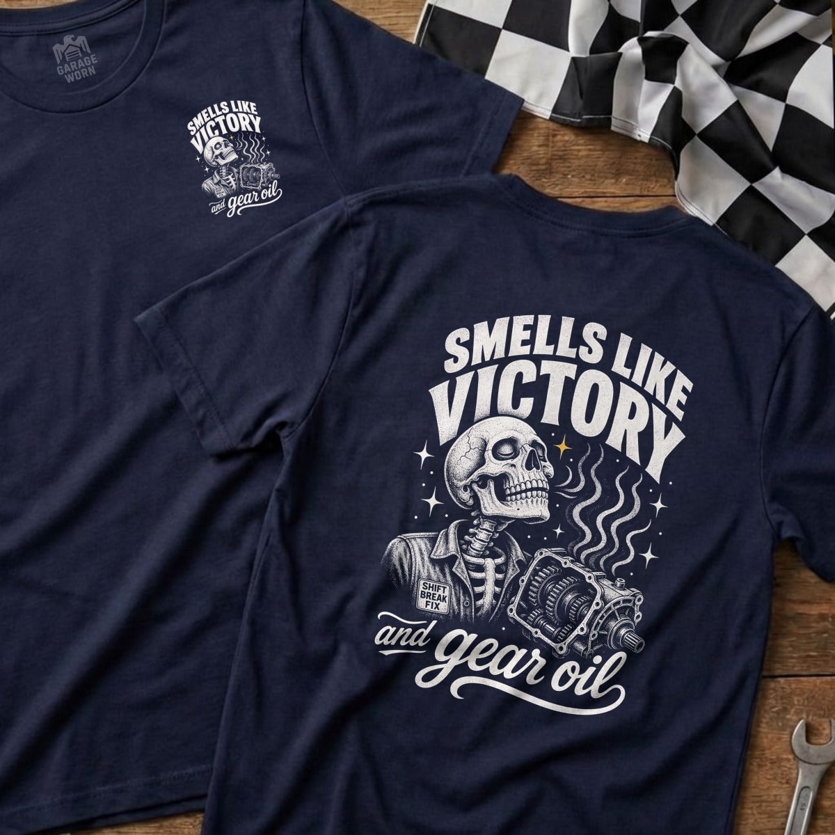 Navy t-shirt with skeleton, transmission, and "Smells Like Victory and Gear Oil" text.