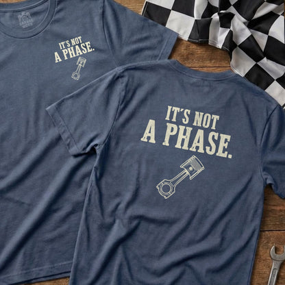 Two dark blue t-shirts with "IT'S NOT A PHASE." and a piston graphic.