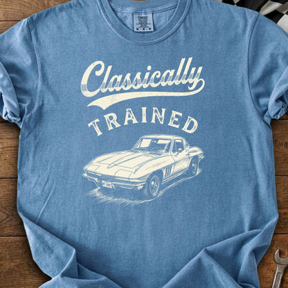 Blue t-shirt with "Classically TRAINED" text and a vintage car sketch.