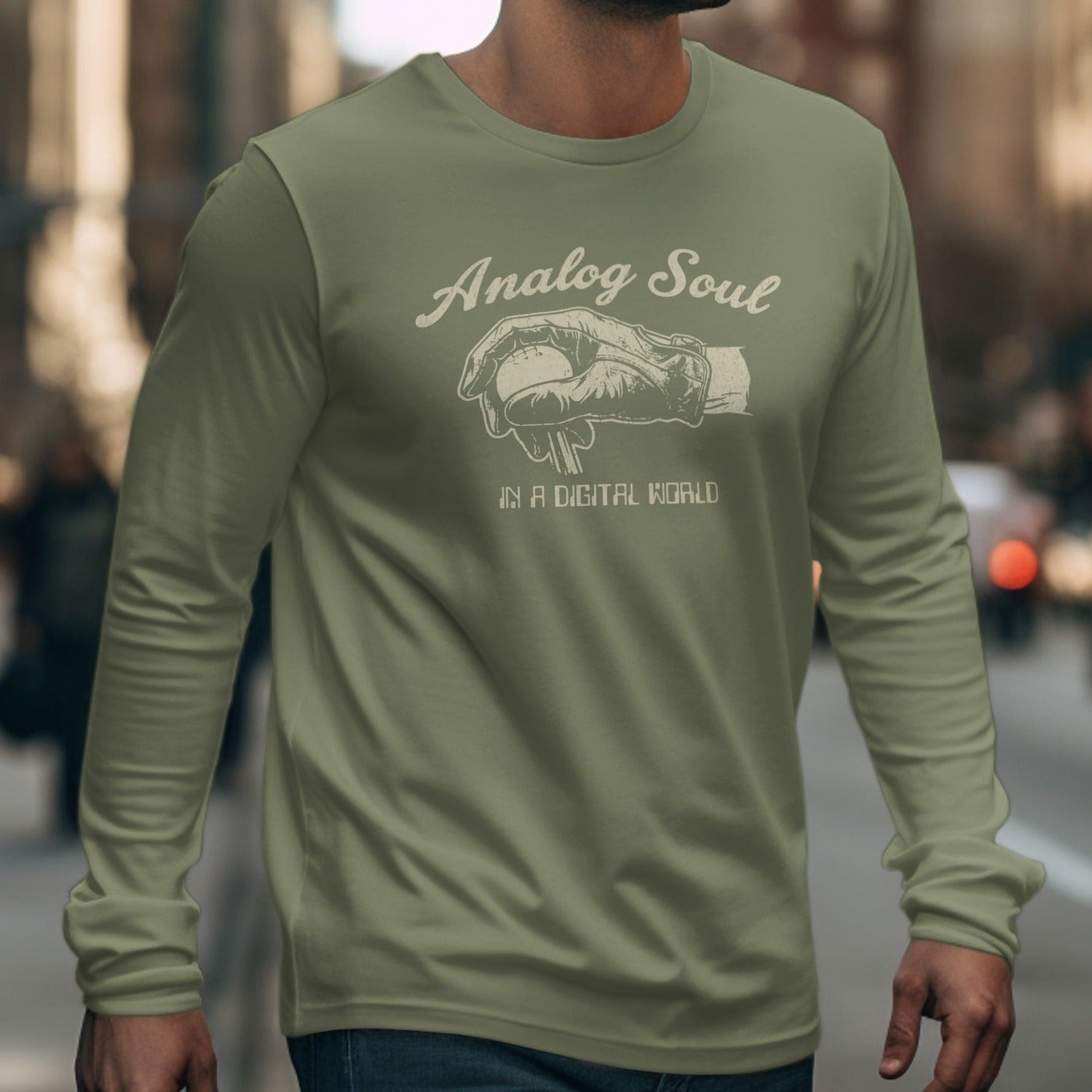 Olive green long sleeve shirt with "Analog Soul IN A DIGITAL WORLD" graphic.