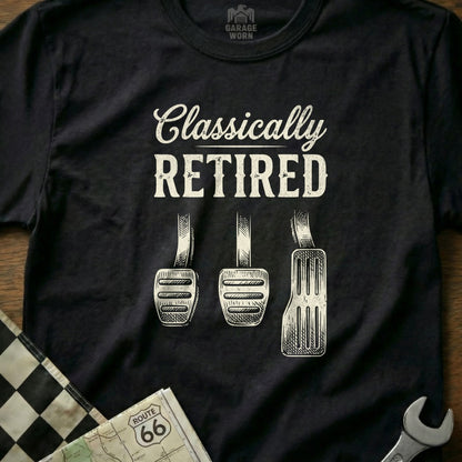 Black t-shirt with "Classically RETIRED" text and car pedals.
