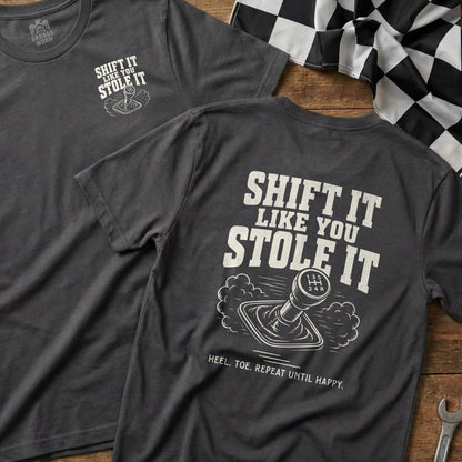 T-shirt with "Shift It Like You Stole It" text and gear shifter graphic.