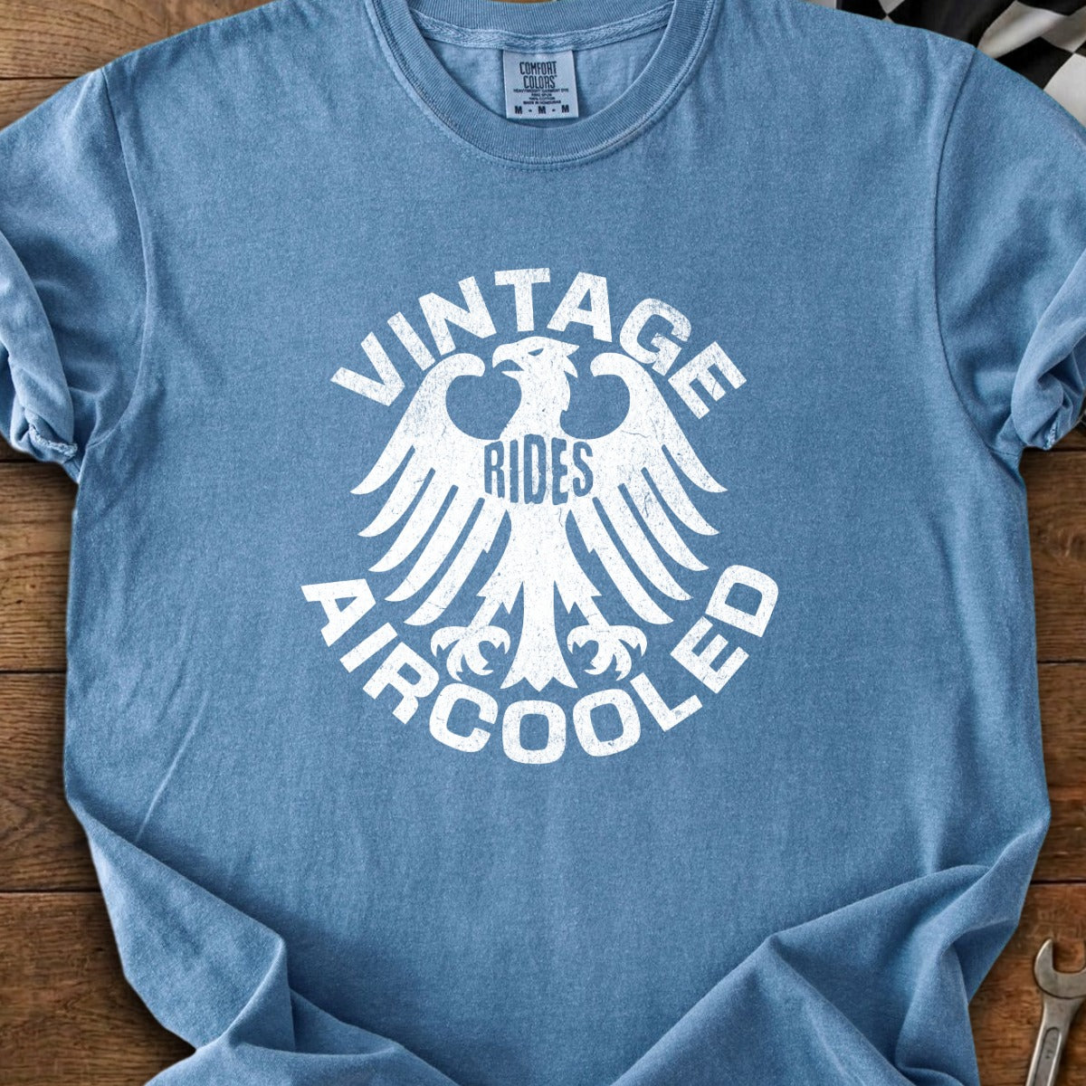 Blue t-shirt with white graphic of eagle, "VINTAGE RIDES AIRCOOLED".