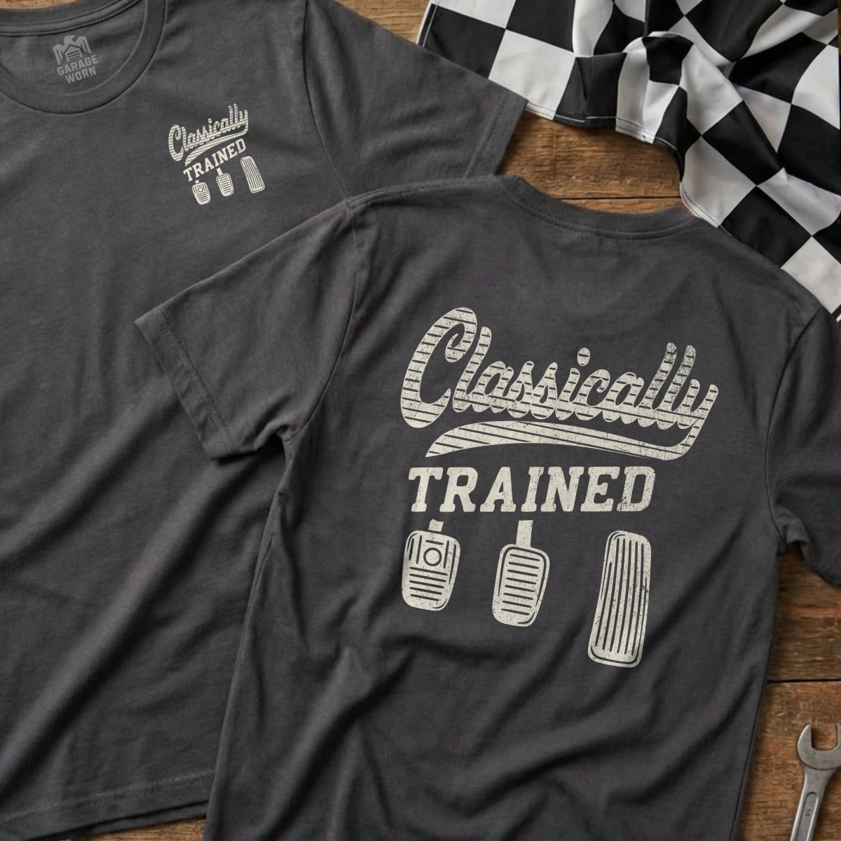 Dark grey t-shirt with "Classically Trained" and three pedals graphic.