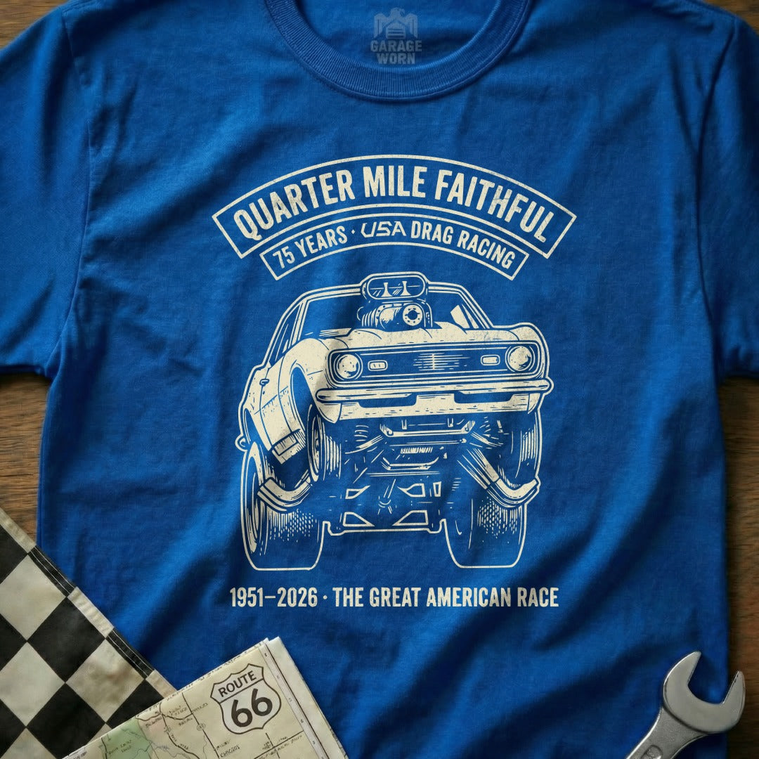 Blue t-shirt with a drag racing car graphic and text.