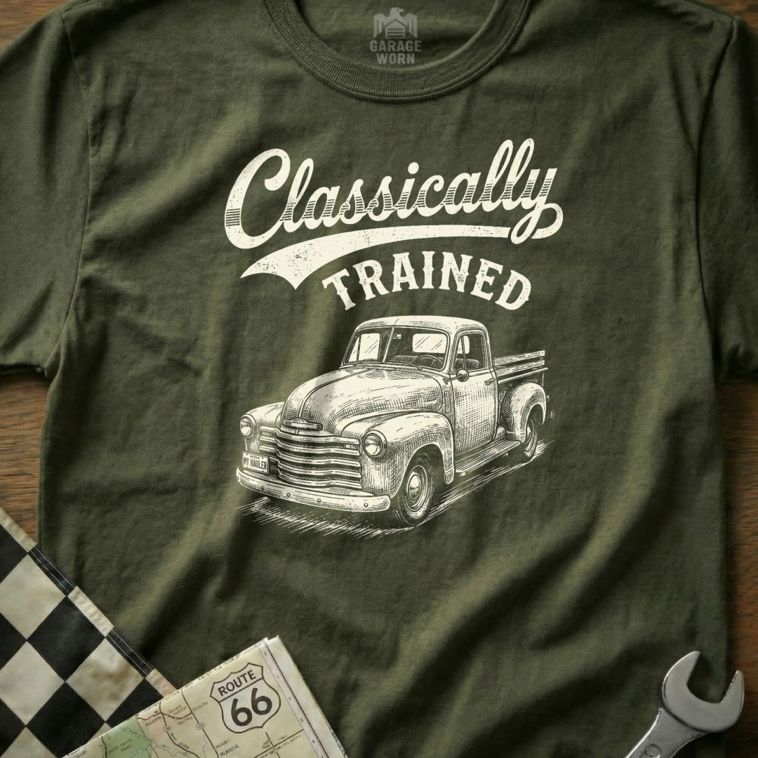 Olive green t-shirt with "Classically TRAINED" text and sketch of an old pickup truck.