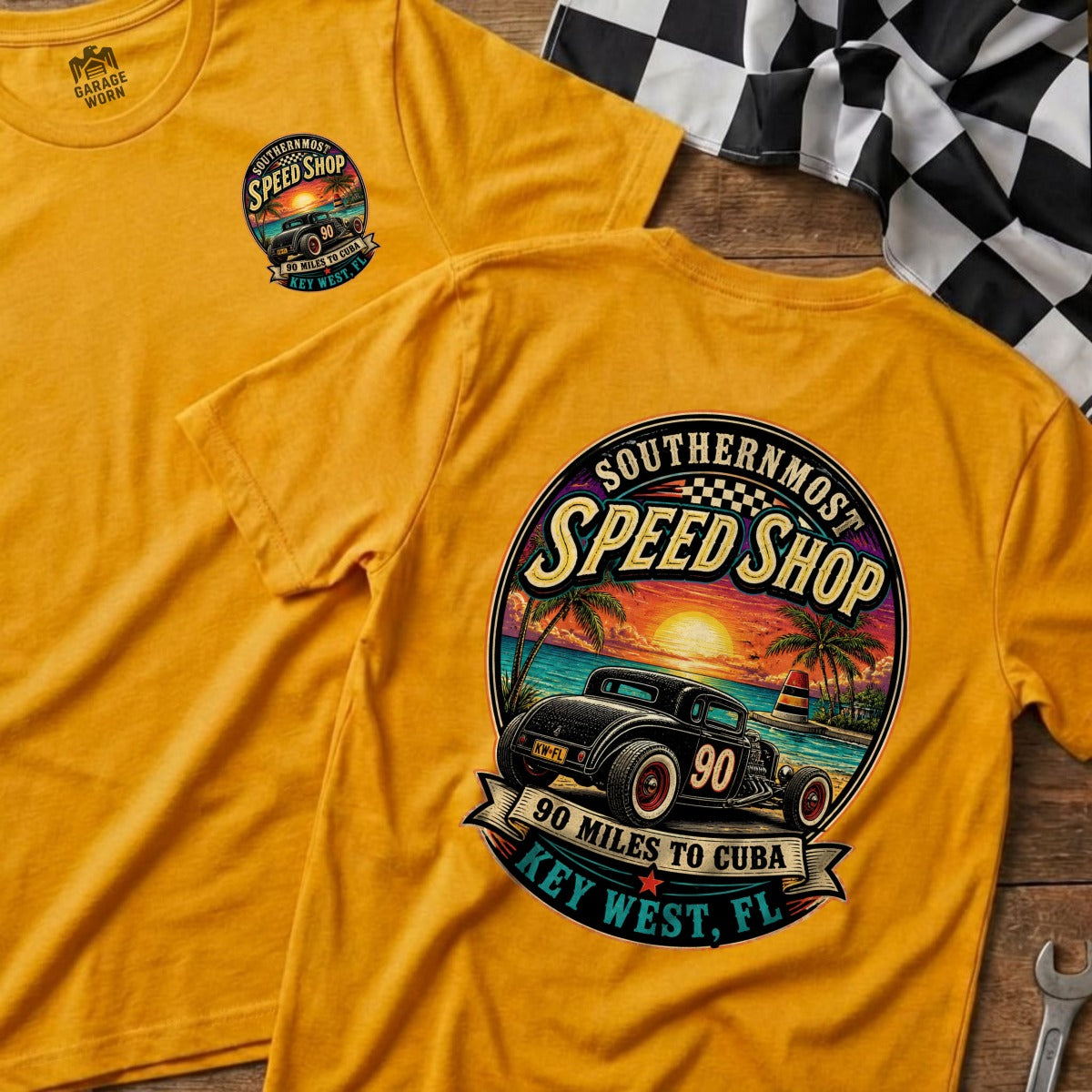Yellow t-shirt with "Southernmost Speed Shop" graphic featuring a vintage car and Key West scenery.