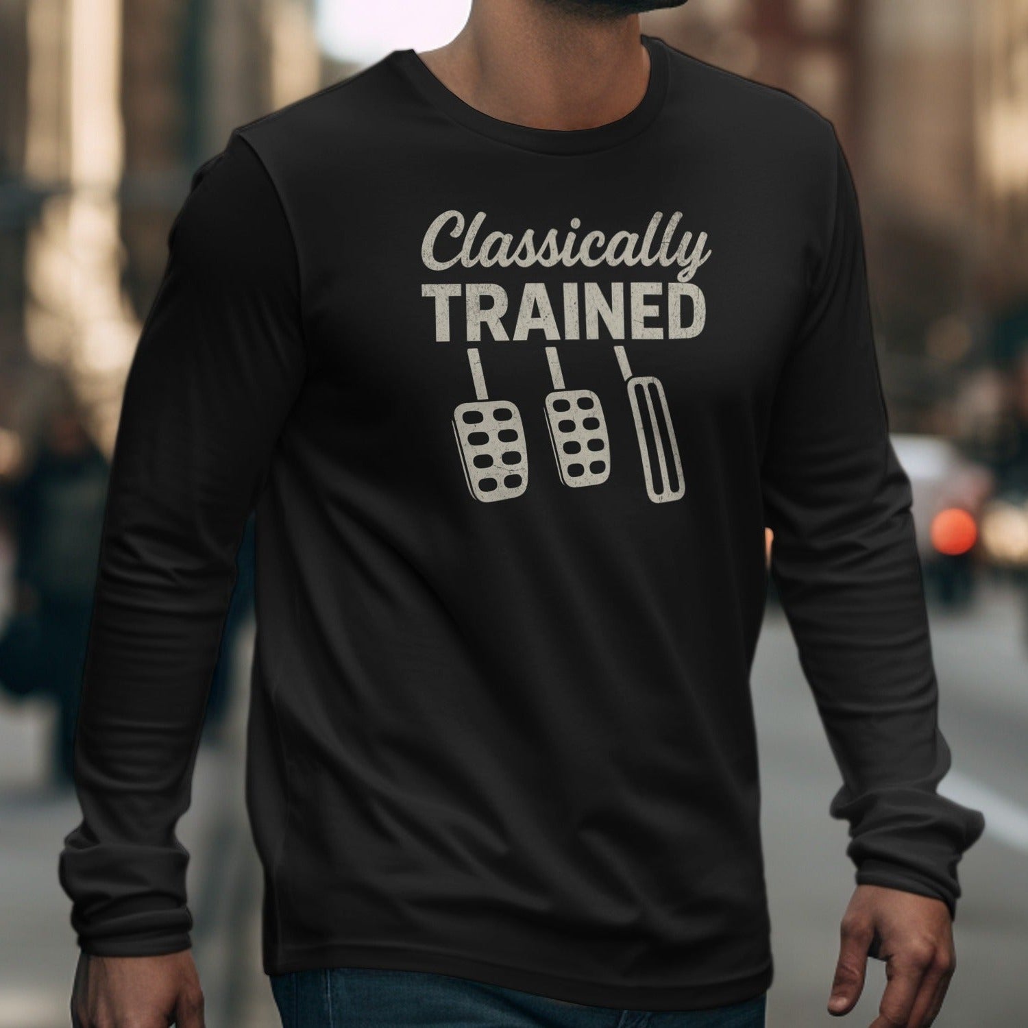 Black long-sleeve shirt with "Classically TRAINED" and three pedals graphic.