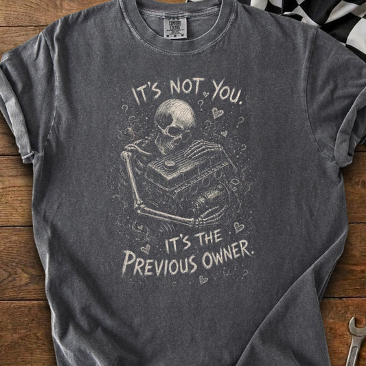 Skeleton holding an engine, with text "It's not you. It's the previous owner."