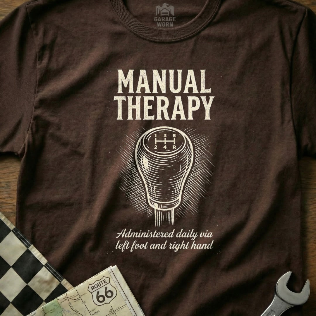 Brown t-shirt with "Manual Therapy" and gear shift design.