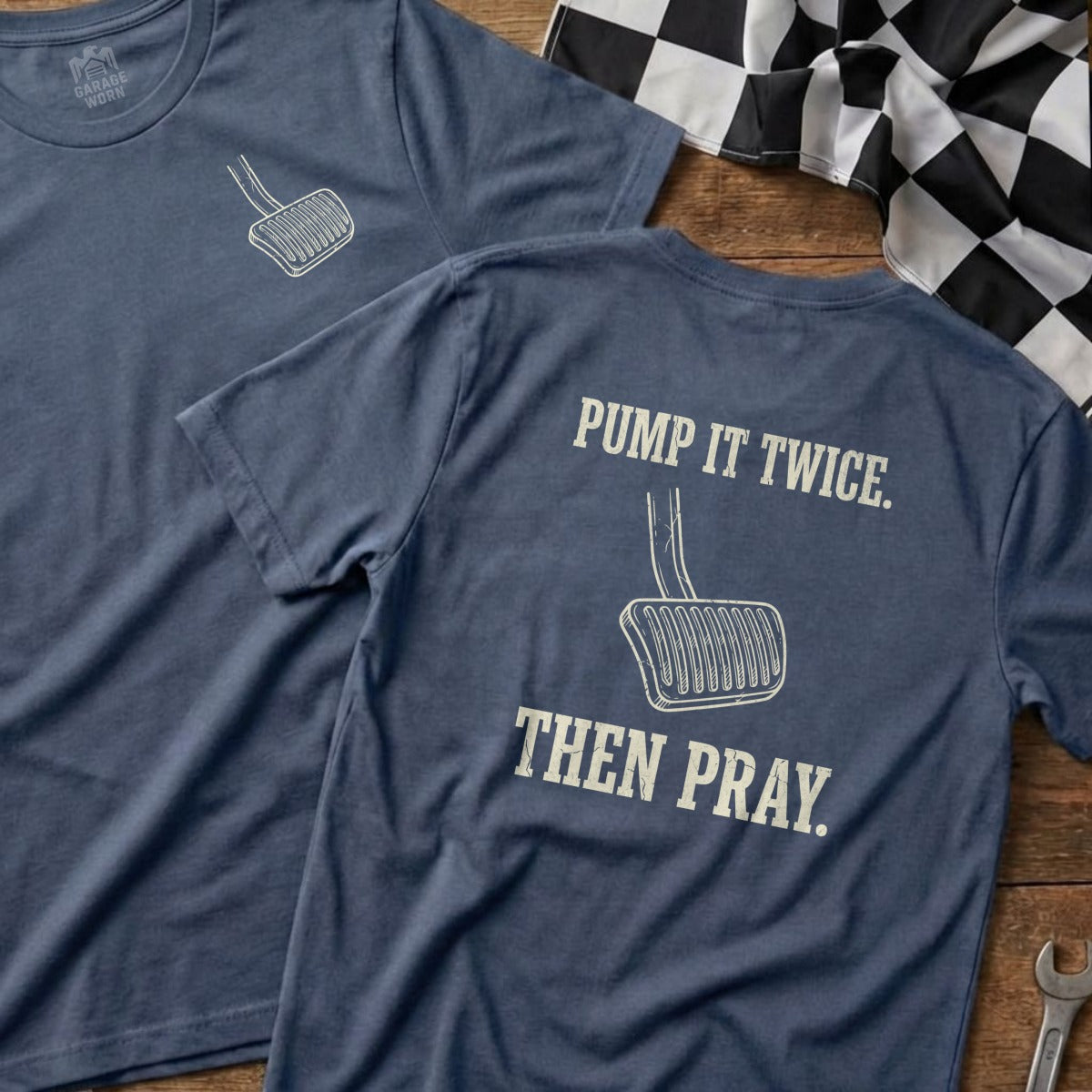Blue t-shirt with car pedal graphic and text "PUMP IT TWICE. THEN PRAY."