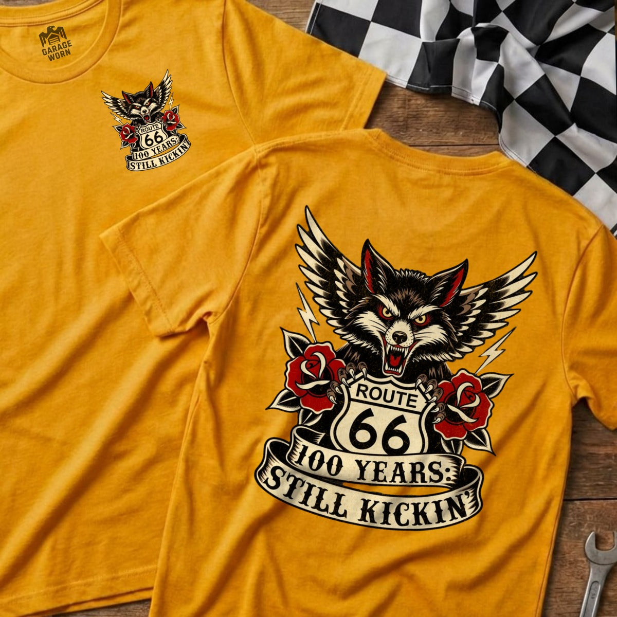 Yellow t-shirt with Route 66 wolf graphic: "100 Years: Still Kickin."