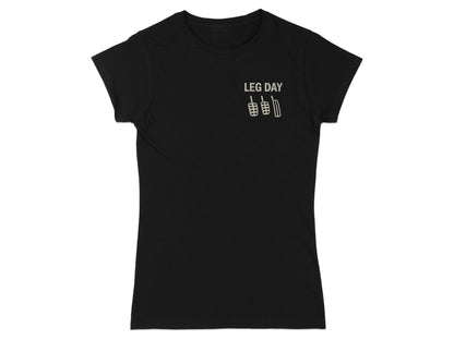 Black t-shirt with "LEG DAY" text and pedal graphics.