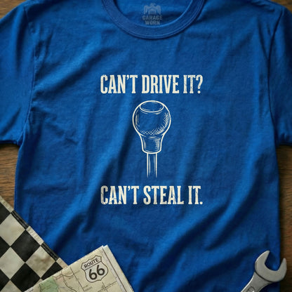 Blue t-shirt with "Can't Drive It? Can't Steal It." and a gear shift graphic.