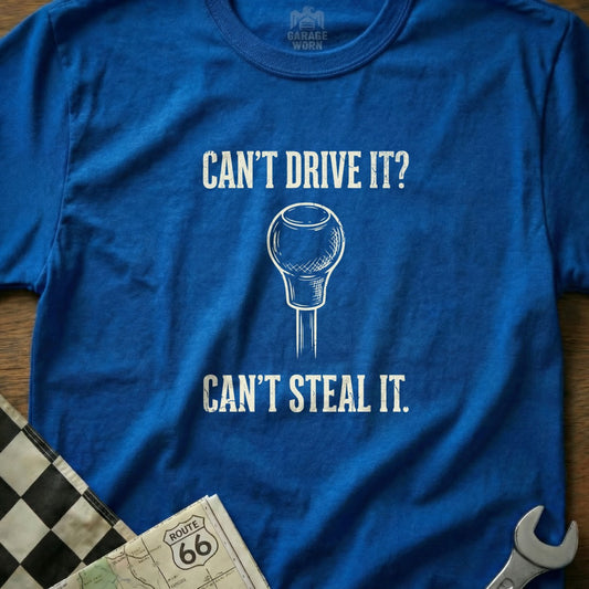 Blue t-shirt with "Can't Drive It? Can't Steal It." and a gear shift graphic.